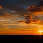 Sonnenuntergang am Leuchtturm Westerheversand