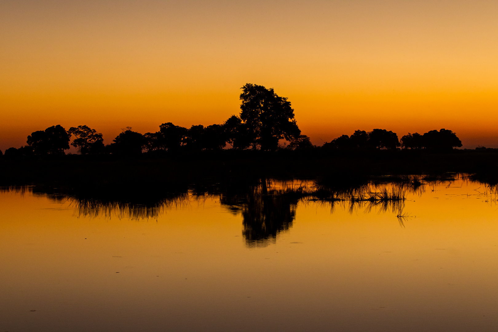 Sonnenuntergang am Linyanti, Botswana