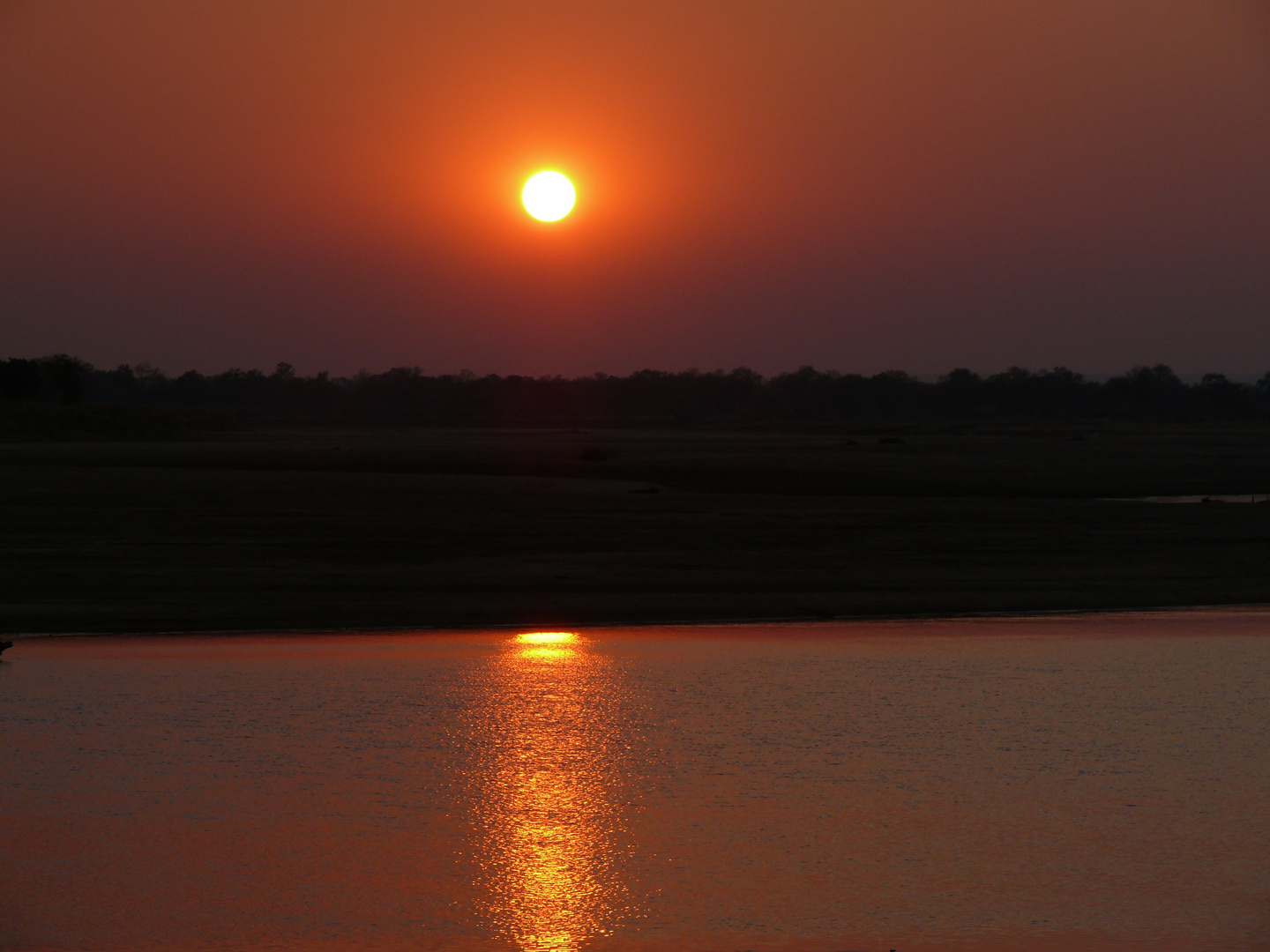 Sonnenuntergang am Luangwafluß