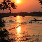 Sonnenuntergang am Okavango in der Riverdance Lodge