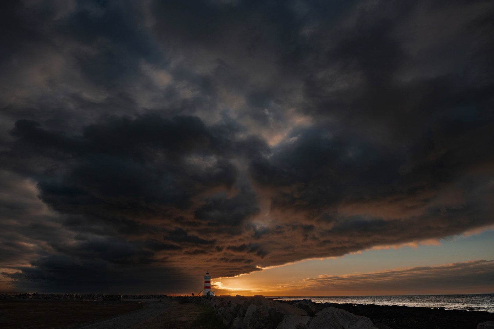 Sonnenuntergang am Old Lighthouse Garður