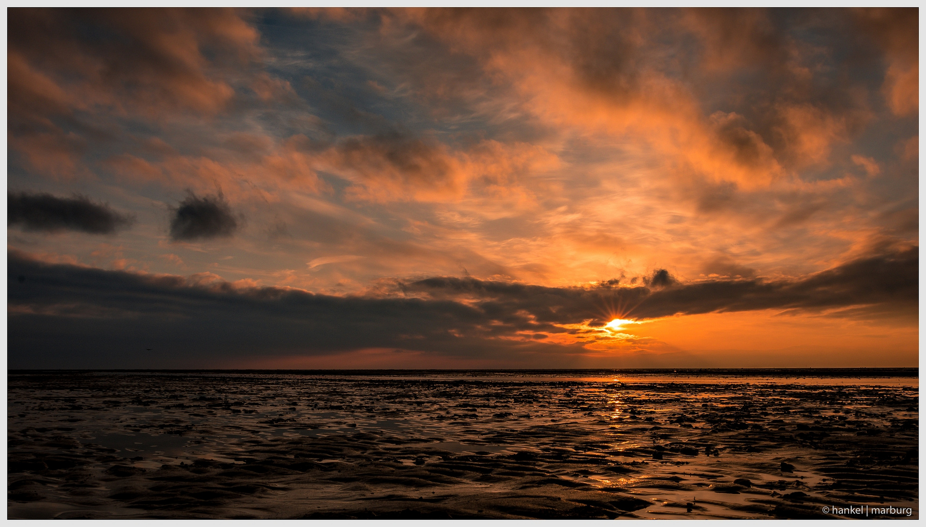 Sonnenuntergang am Sahlenburger Strand