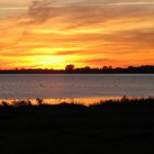 Sonnenuntergang am Salzhaff mit Blick zur Insel Poel