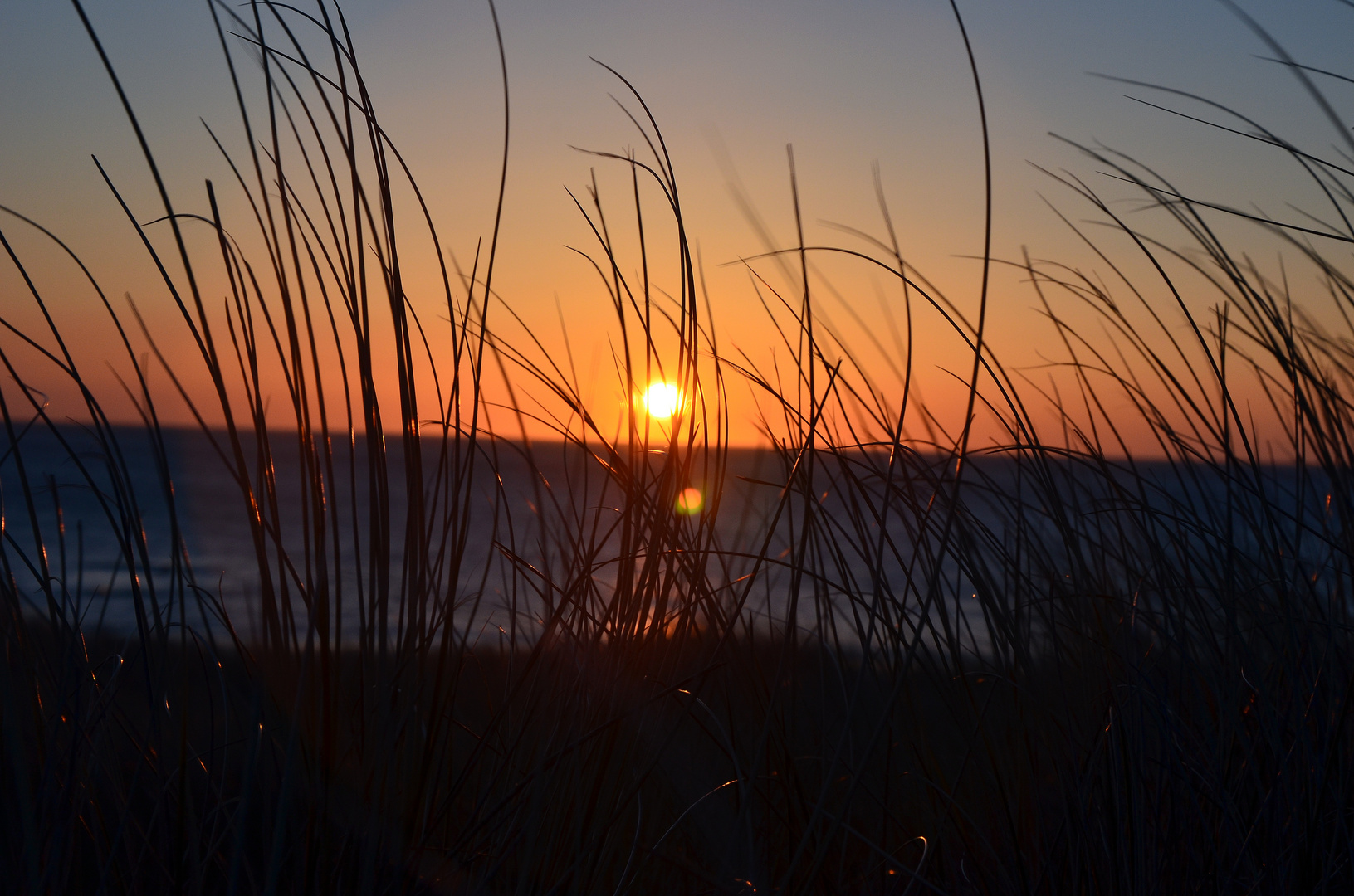 Sonnenuntergang am Strand von Julianadoorp