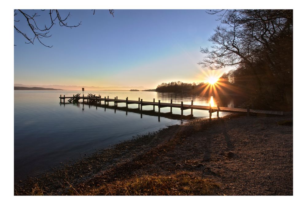 Sonnenuntergang am Surfersteg am Starnberger See