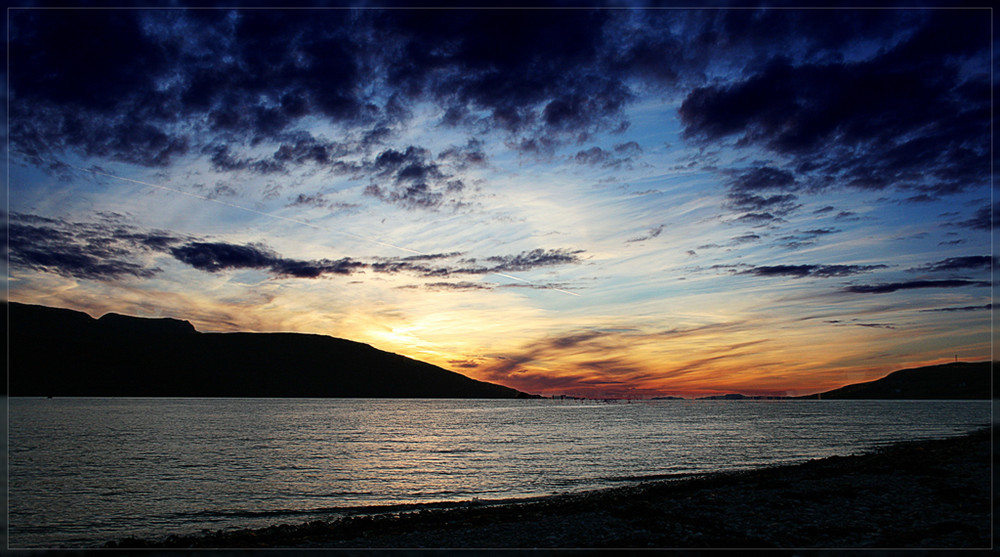 Sonnenuntergang am Wasser