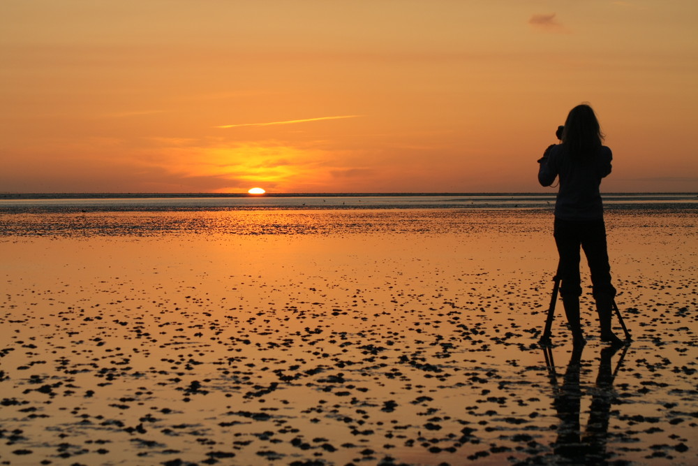 Sonnenuntergang am Wattenmeer in Büsum