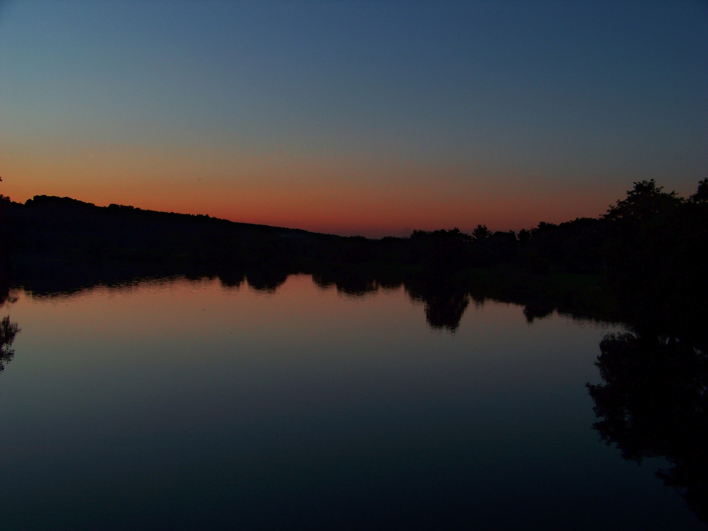 Sonnenuntergang am Wehr