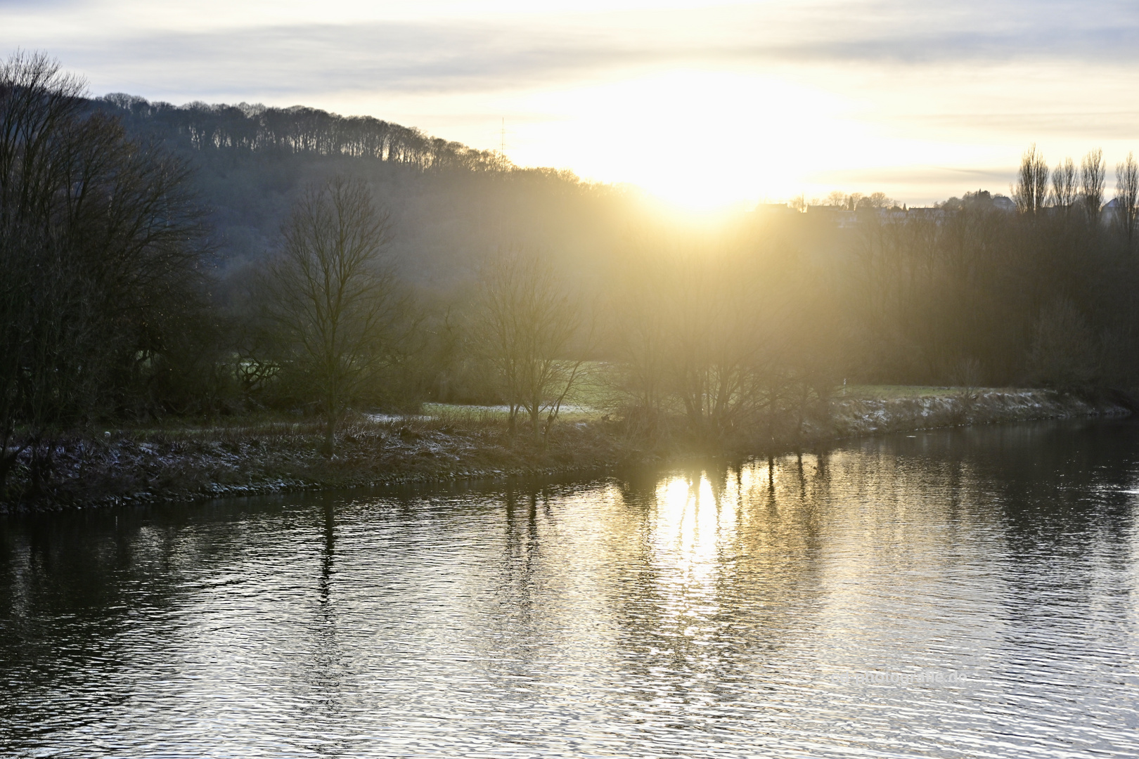 Sonnenuntergang am Wehr