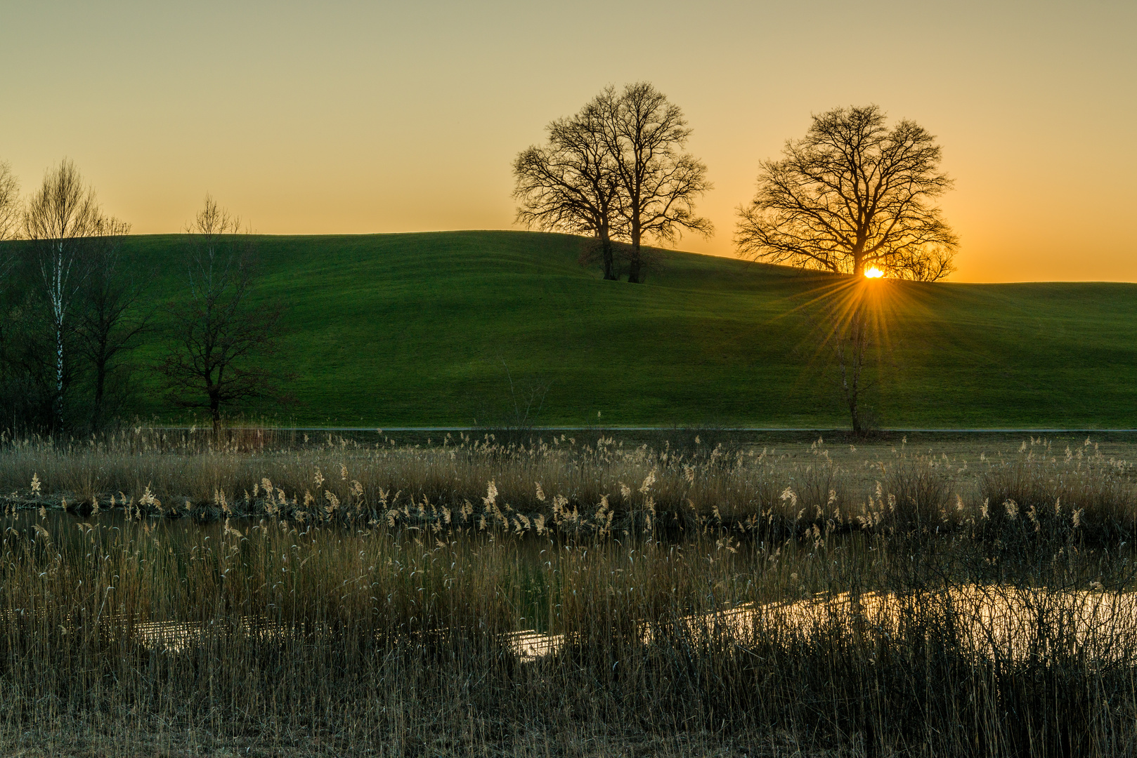 Sonnenuntergang am Weiher