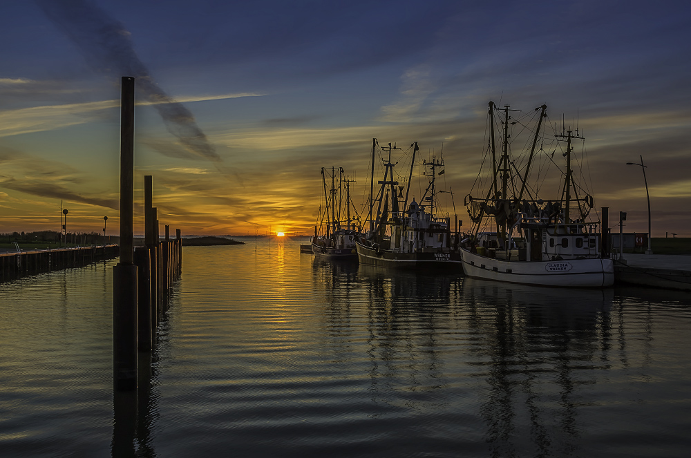 Sonnenuntergang am Wremer Kutterhafen