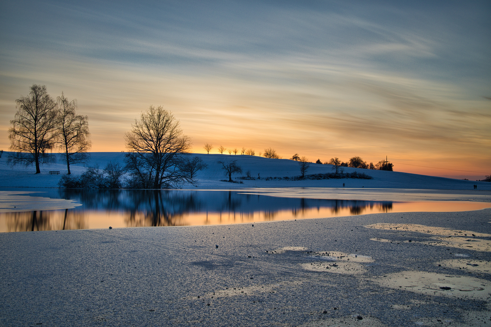 Sonnenuntergang am zufrierenden Eichener See