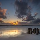 Sonnenuntergang an den Buhnen von Rantum auf Sylt