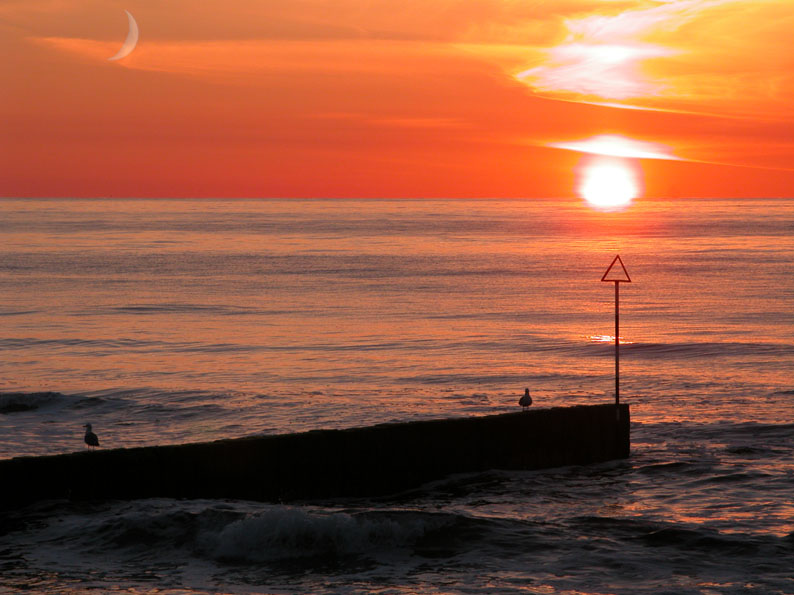 Sonnenuntergang an der Buhne