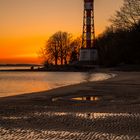 Sonnenuntergang an der Elbe mit Spiegelung