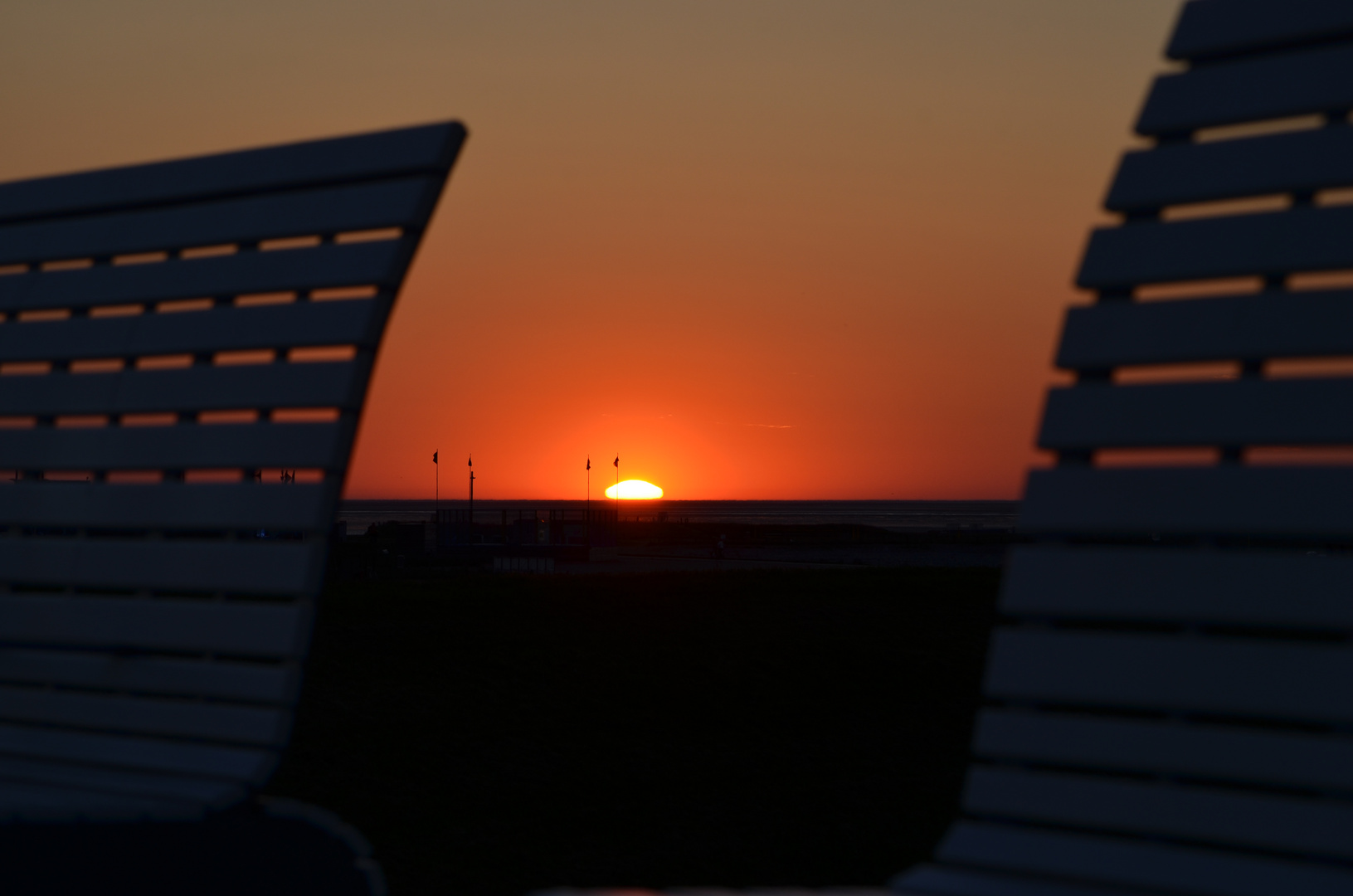 Sonnenuntergang an der Promenade von Büsum