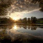 Sonnenuntergang an einen Dorfweiher