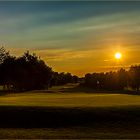 Sonnenuntergang auf dem Golfplatz