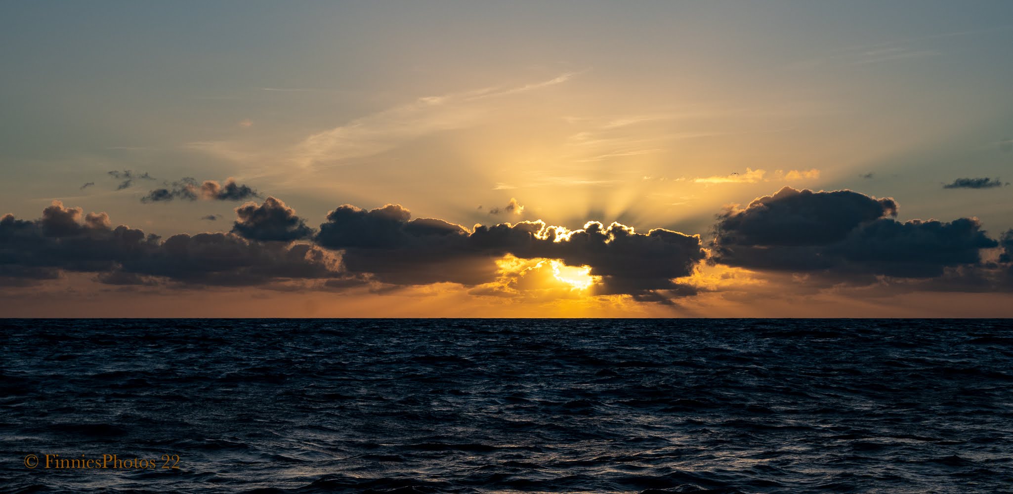 Sonnenuntergang auf dem Mehr bei Land's End England