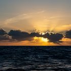 Sonnenuntergang auf dem Mehr bei Land's End England