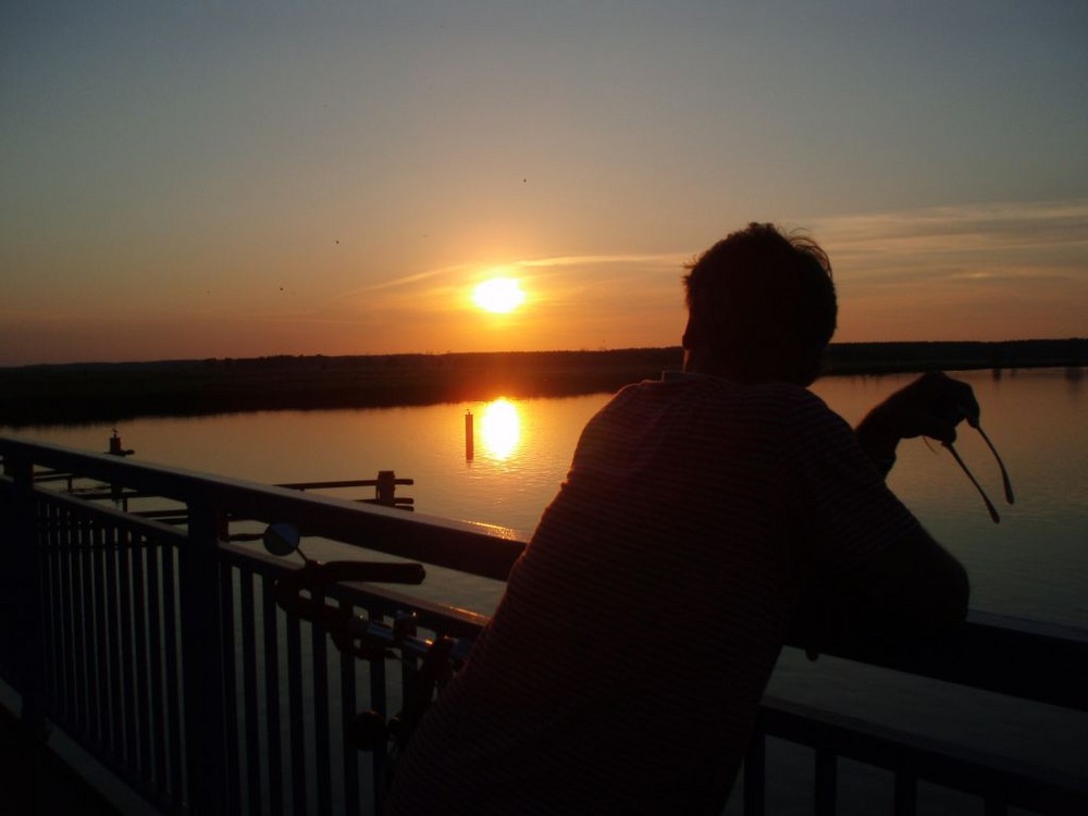 Sonnenuntergang auf der Peenebrücke