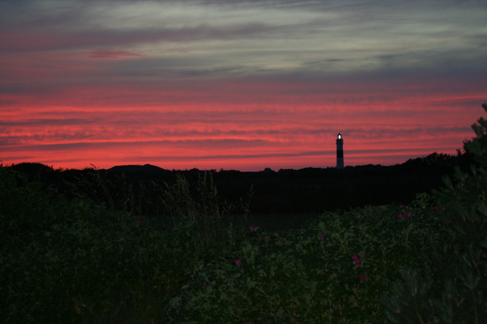 Sonnenuntergang auf Sylt mit Kampener Leuchtturm und Uwedüne