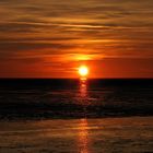 Sonnenuntergang bei Ebbe an der Nordsee