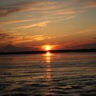 Sonnenuntergang bei Ebbe an der Nordsee, Strand von Nessmersiel