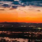 Sonnenuntergang bei Hochwasser am Rhein