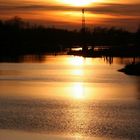 Sonnenuntergang bei Hohensaaten an einem Seitenarm der Oder
