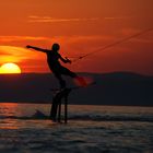 Sonnenuntergang beim Wake-Boarden