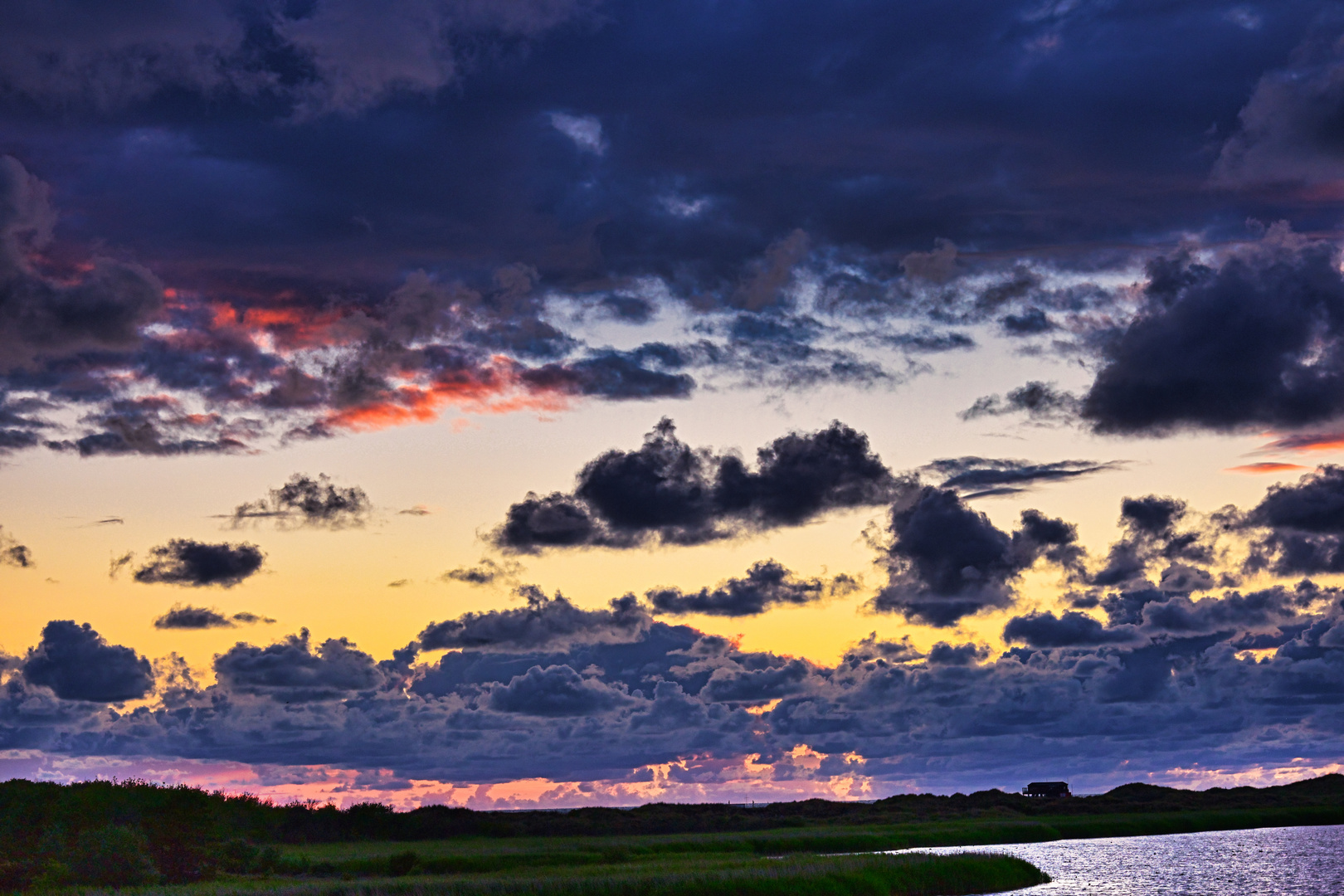 Sonnenuntergang hinter den Dünen