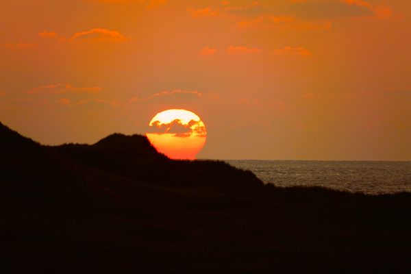 Sonnenuntergang hinter den Dünen...