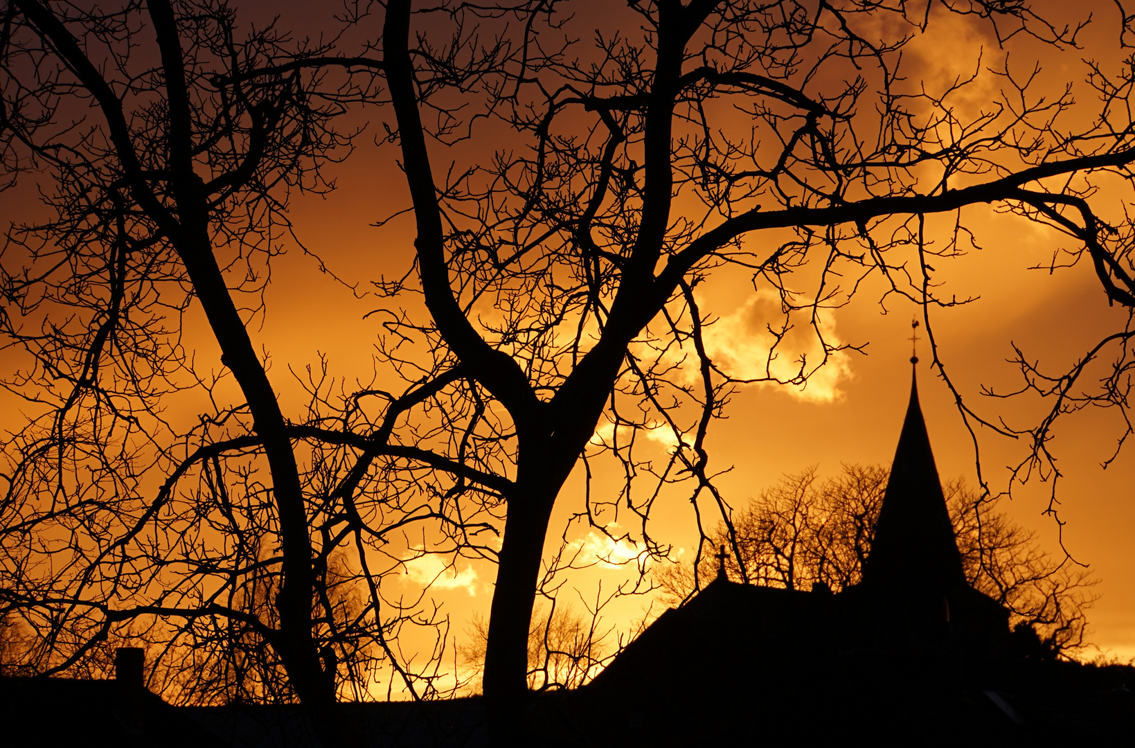 Sonnenuntergang hinter St. Johannis, Nordstemmen