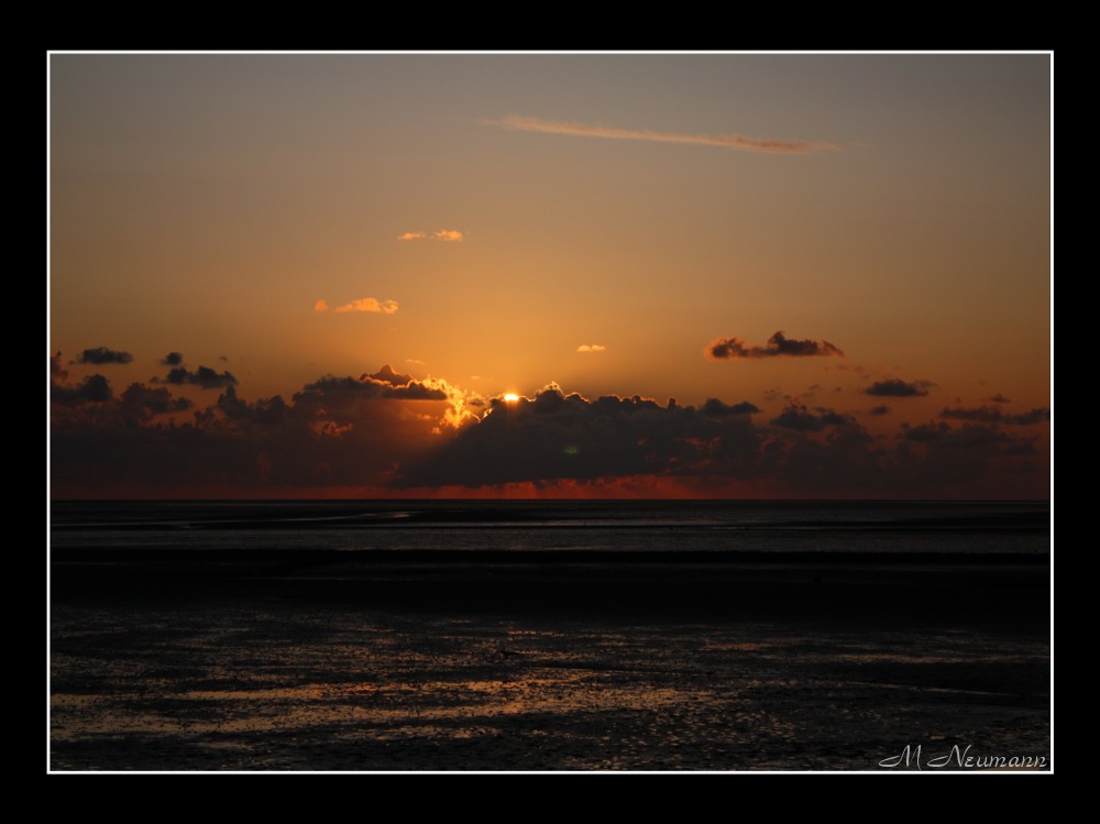 Sonnenuntergang hinter Wolken