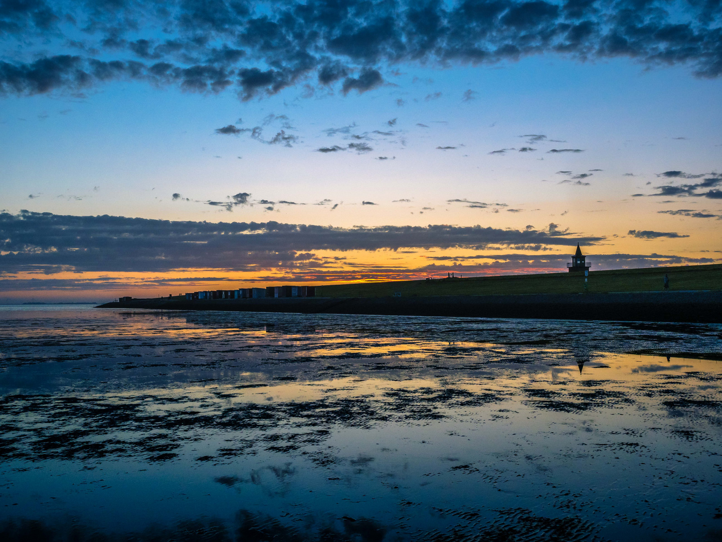 Sonnenuntergang hinterm Deich von Dagebüll