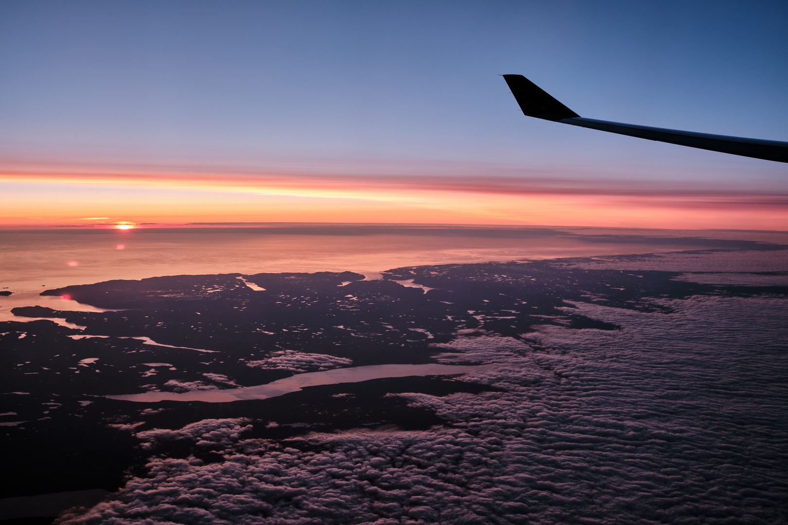 Sonnenuntergang im Flugzeug