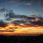 Sonnenuntergang im Industriehafen vor Bangkok