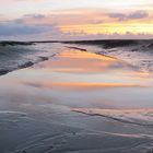 Sonnenuntergang im Watt an der Nordsee