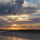 Sonnenuntergang im Watt der Nordsee