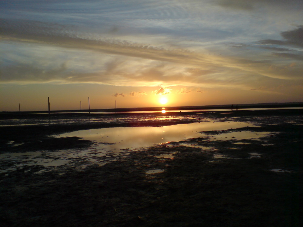 Sonnenuntergang im Watt von Bensersiel