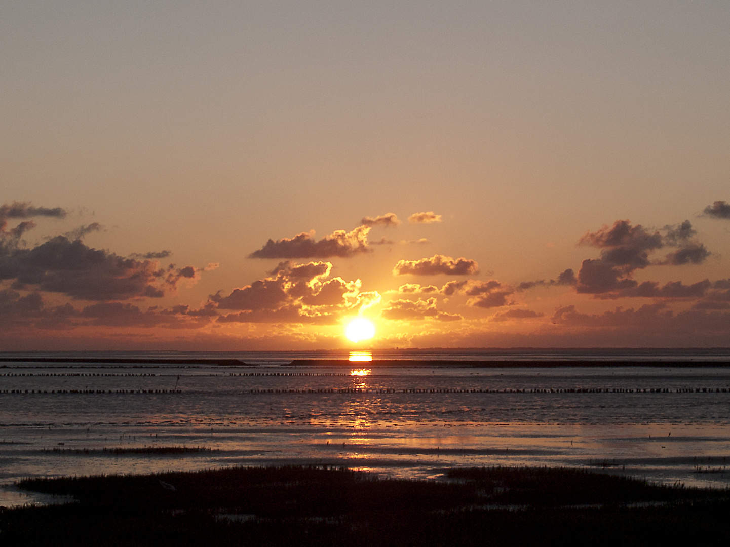 Sonnenuntergang im Wattenmeer