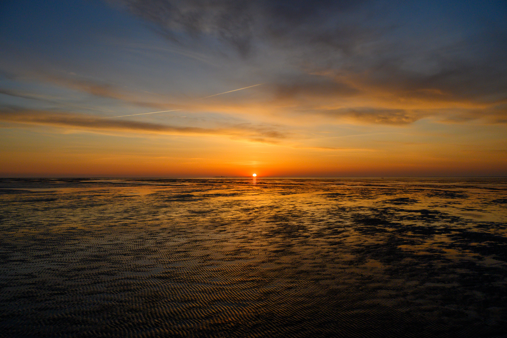 Sonnenuntergang im Wattenmeer