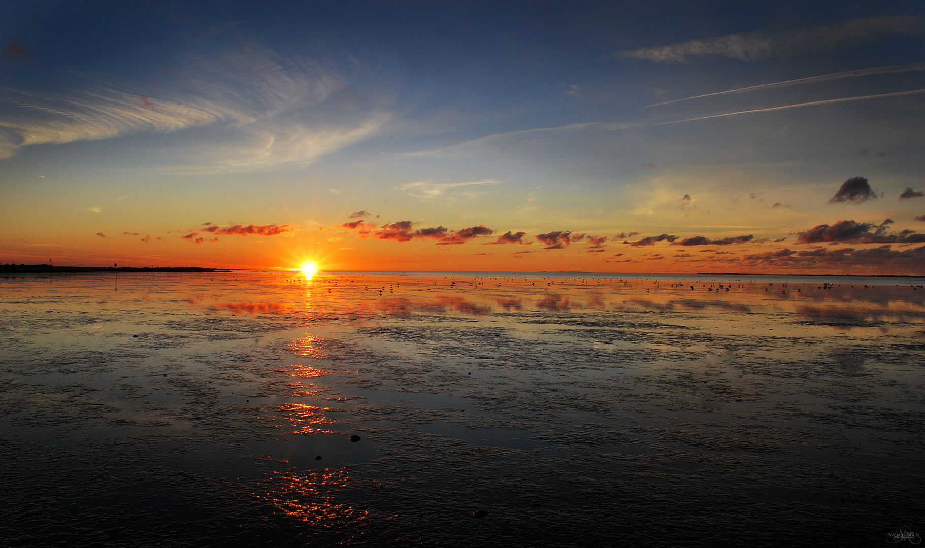 Sonnenuntergang im Wattenmeer bei Harlesiel