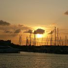 Sonnenuntergang im Yachthafen von Port Zelande