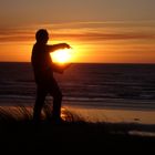 sonnenuntergang in den händen halten