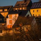 Sonnenuntergang in der Fensterspiegelung