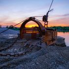 Sonnenuntergang in der Schaufel gefangen