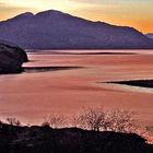 Sonnenuntergang in Dornie mit Blick auf Eilean Donan Castle und die Insel Skye