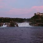 Sonnenuntergang mit Abendrot am Rheinfall bei Schaffhausen/Schweiz